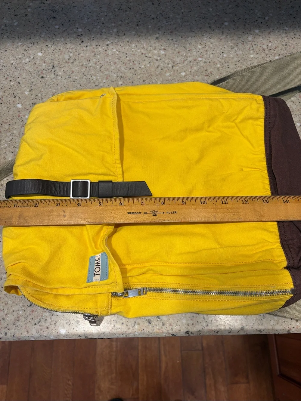 TOMS Citrus Waxed Canvas Trekker Backpack with Brown Base and Roll-Top Closure
